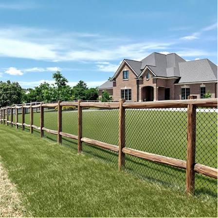 Residential chain link fence with wood posts