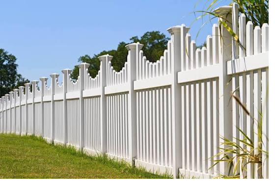 White vinyl scalloped picket