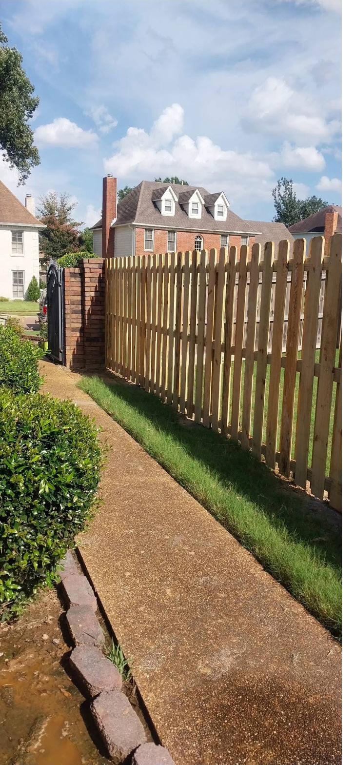 Spaced picket cedar along walkway