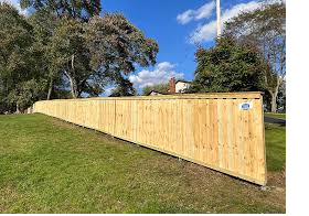 Privacy fence stepped down a slope